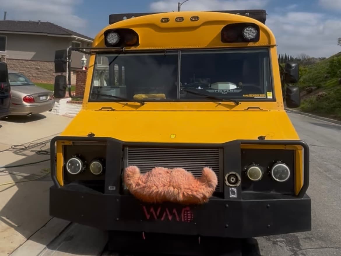 Custom yellow utility vehicle after exterior cleaning
